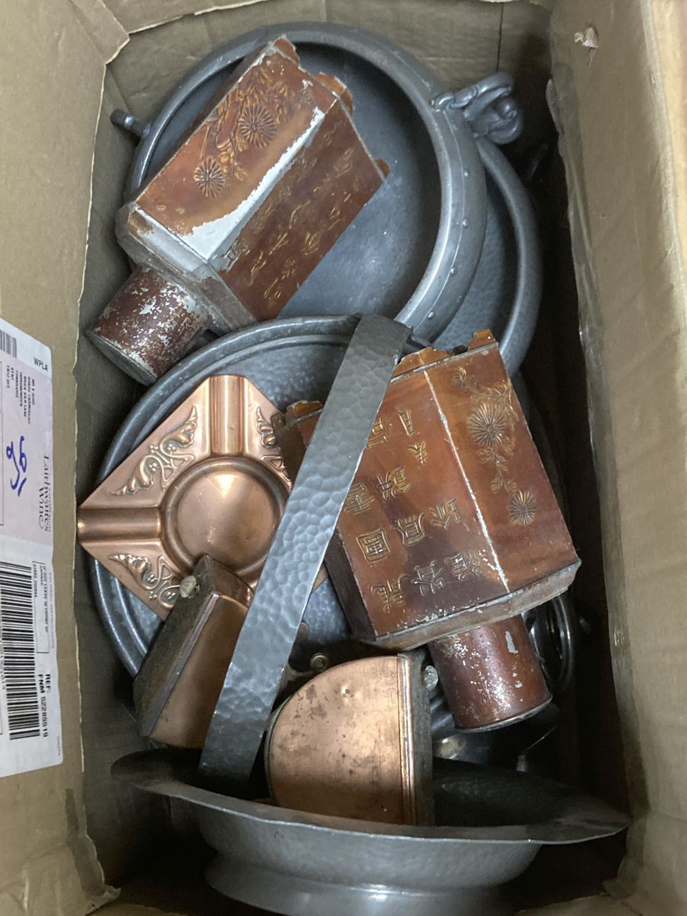 A collection of mixed hammered pewter and copper tea caddies, including two Chinese hexagonal tea canisters and covers, later 18cm